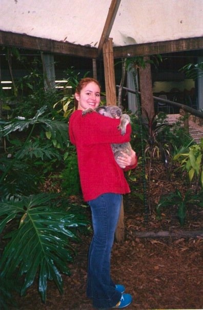 Mags on the Move holding a koala