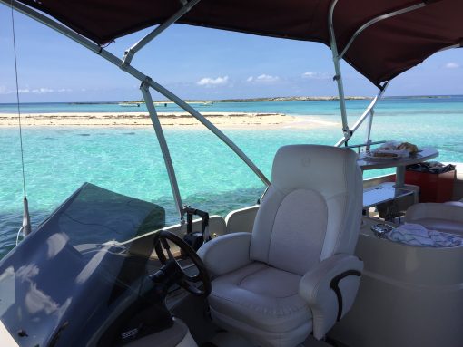 Take a boat out to Honeymoon Harbor to swim with stingrays while staying at Resorts World Bimini in the Bahamas