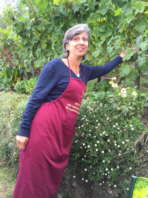 Examining the vines at Paris' only working vineyard, Clos Montmartre