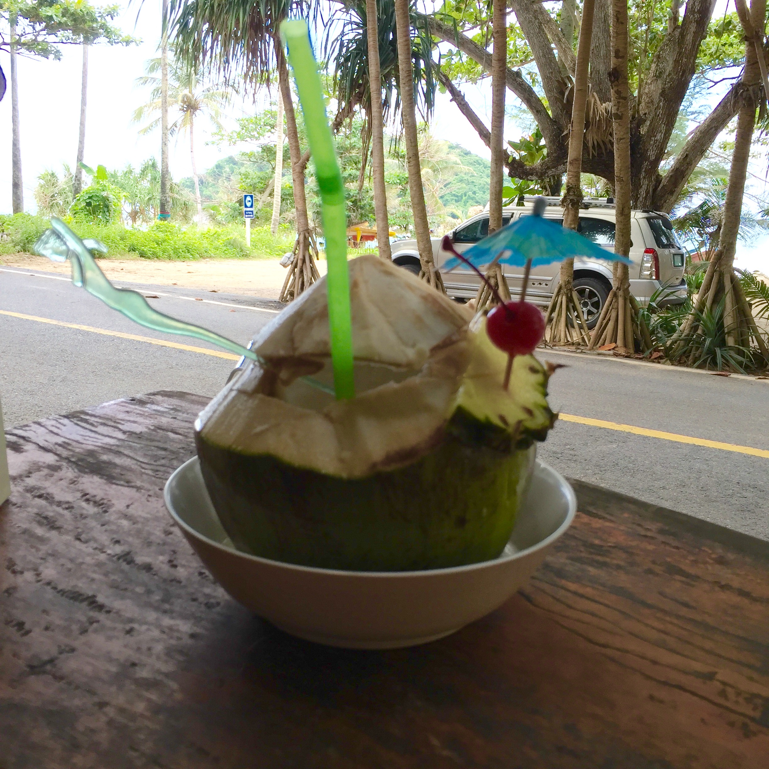 Fresh Coconut Pina Colada on Yanui Beach in Phuket, Thailand.